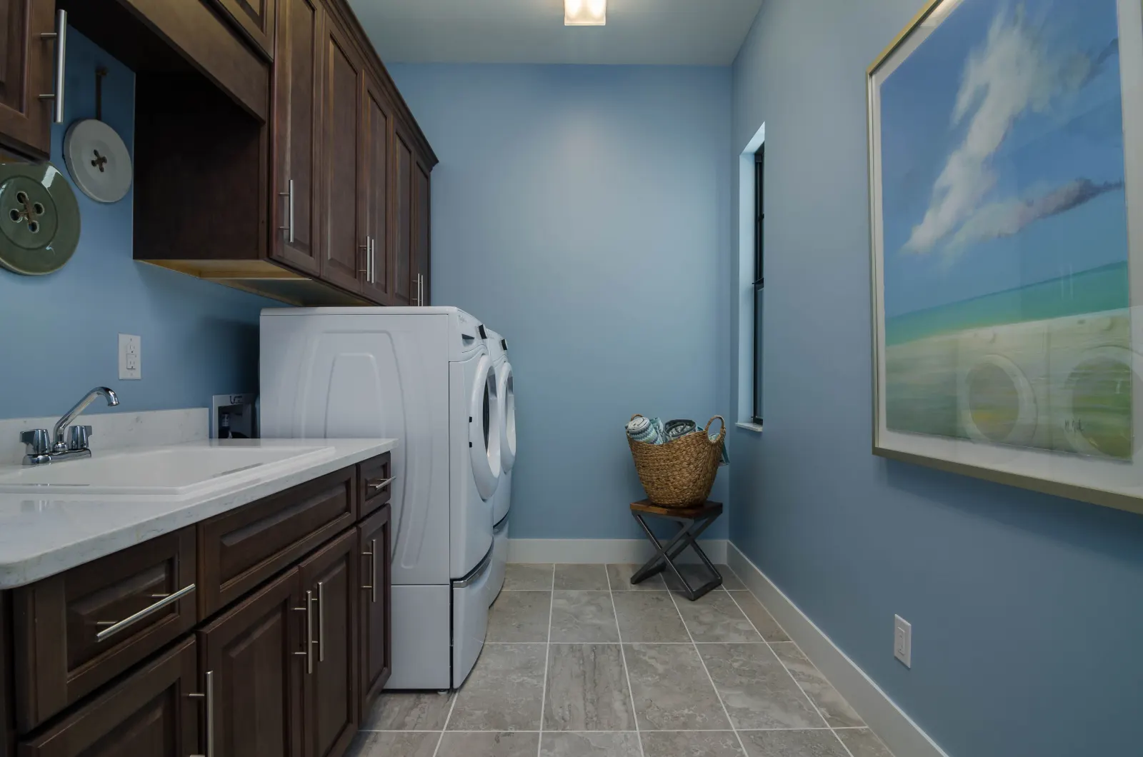 Laundry room at The Captiva Model, a custom home built by Marvin Homes in Naples, Florida