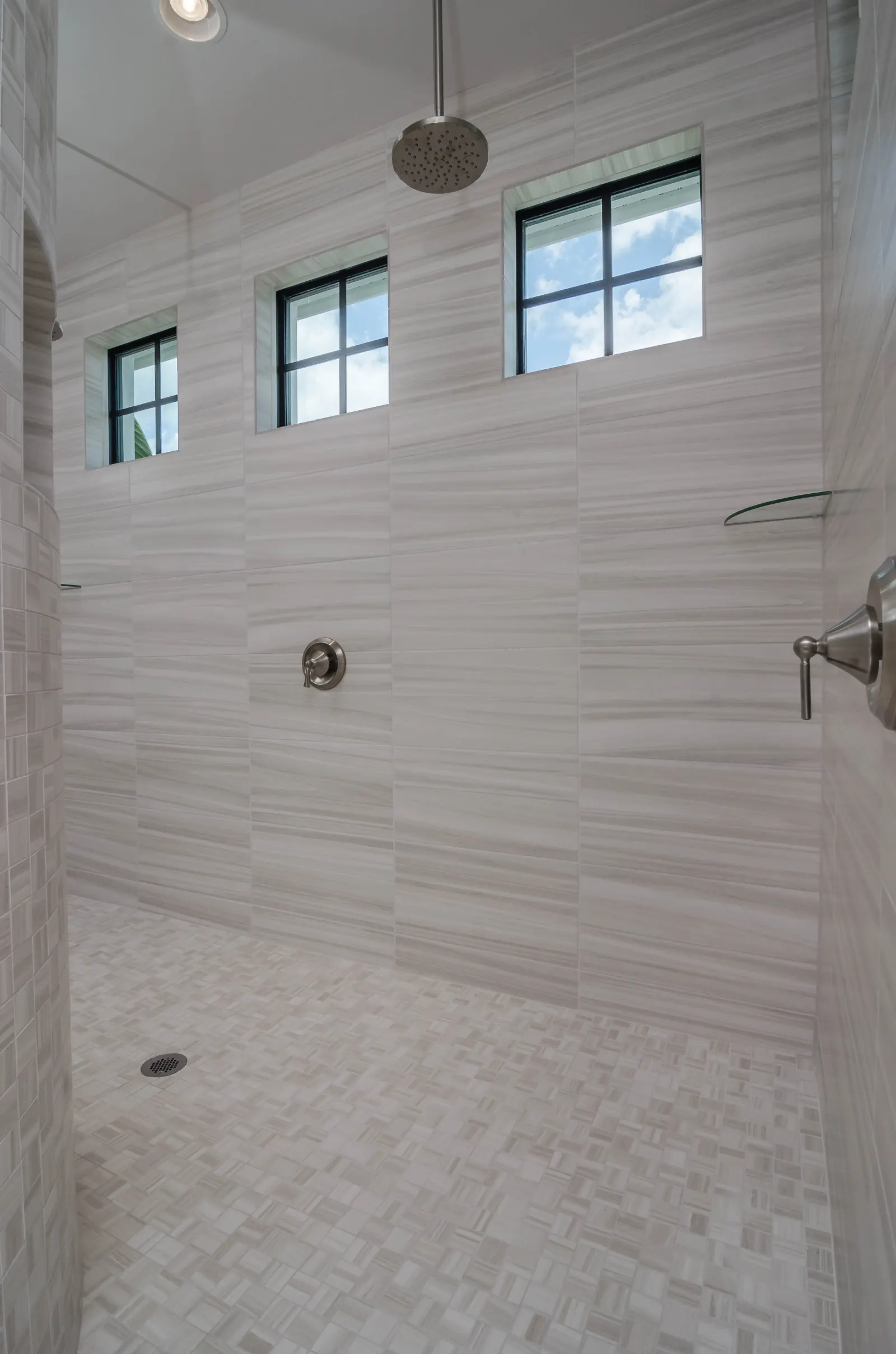 Master bathroom shower at The Captiva Model, a custom home built by Marvin Homes in Naples, Florida