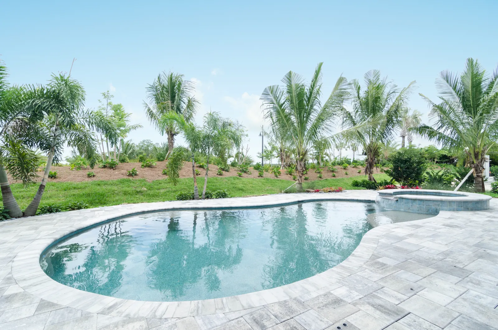 Pool spa at The Captiva Model, a custom home built by Marvin Homes in Naples, Florida
