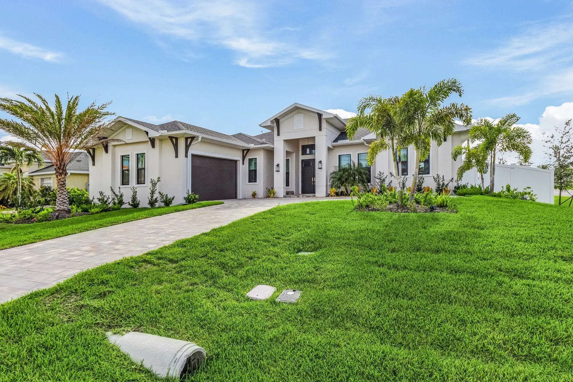 Exterior single story white in a custom home built by Marvin Homes in Southwest Florida