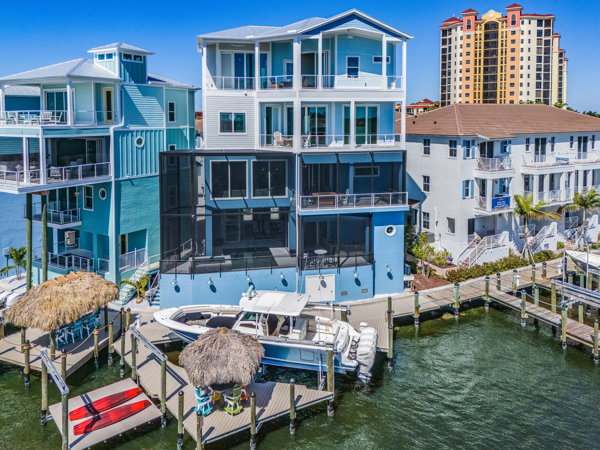 Exterior waterfront boat dock — custom home built by Marvin Homes in Southwest Florida