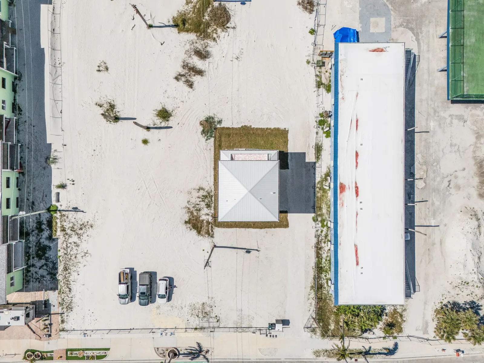 Aerial rooftop topdown at The Flamingo, a custom home built by Marvin Homes in Fort Myers Beach, Florida
