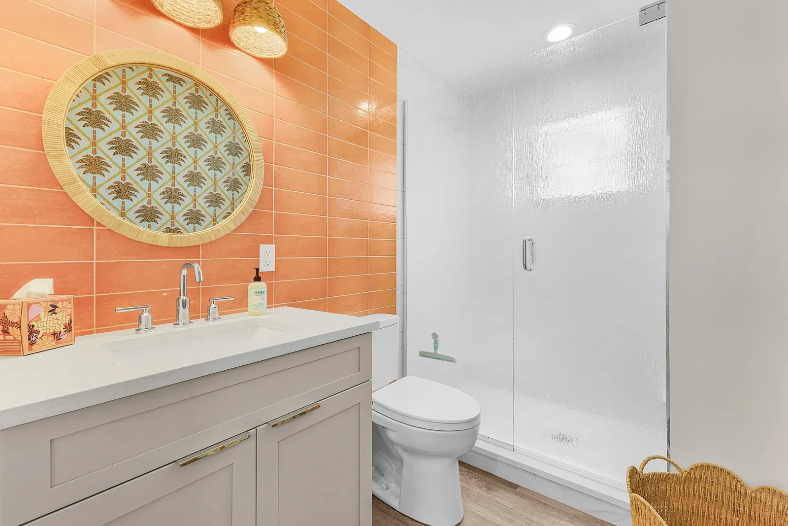 Bathroom orange tile at The Flamingo, a custom home built by Marvin Homes in Fort Myers Beach, Florida