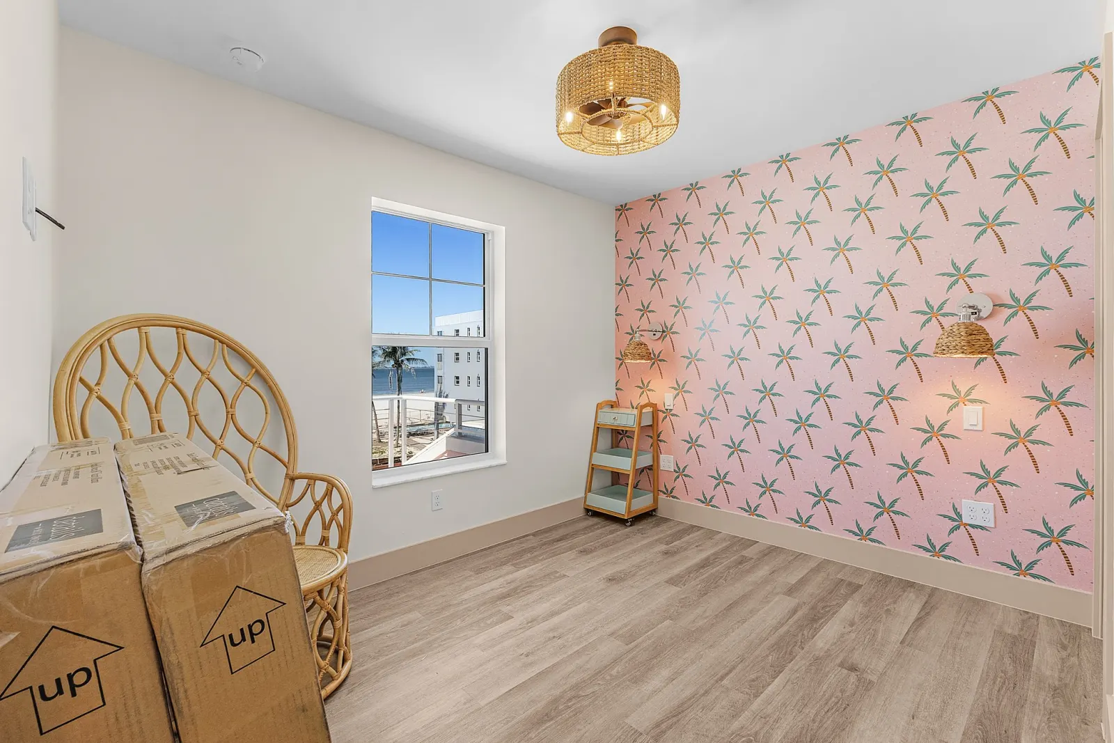 Bedroom pink palm at The Flamingo, a custom home built by Marvin Homes in Fort Myers Beach, Florida