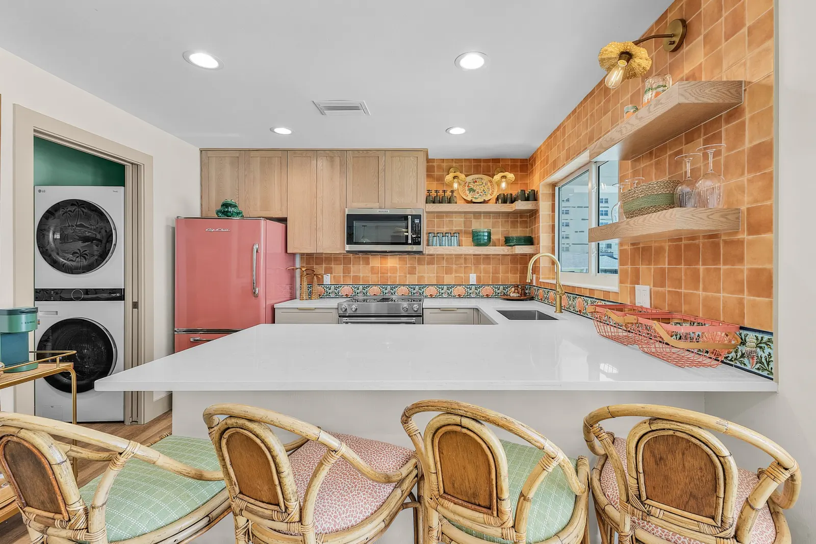 Kitchen laundry nook at The Flamingo, a custom home built by Marvin Homes in Fort Myers Beach, Florida