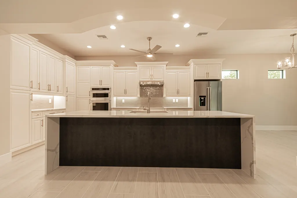 Kitchen appliance wall at The Heron House, a custom home built by Marvin Homes in Naples, Florida
