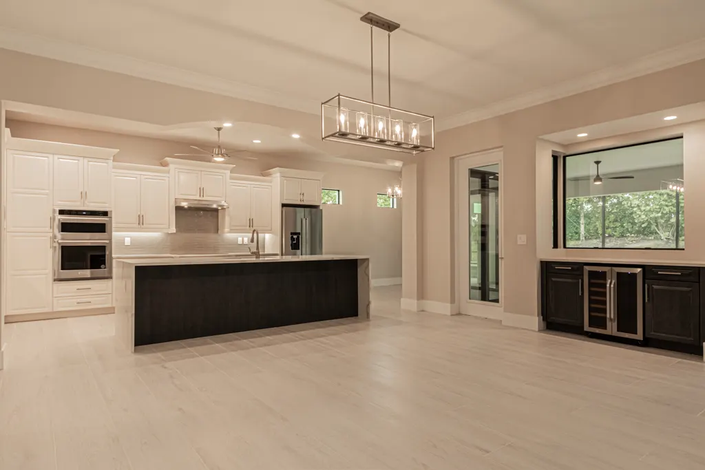 Kitchen wet bar nook at The Heron House, a custom home built by Marvin Homes in Naples, Florida