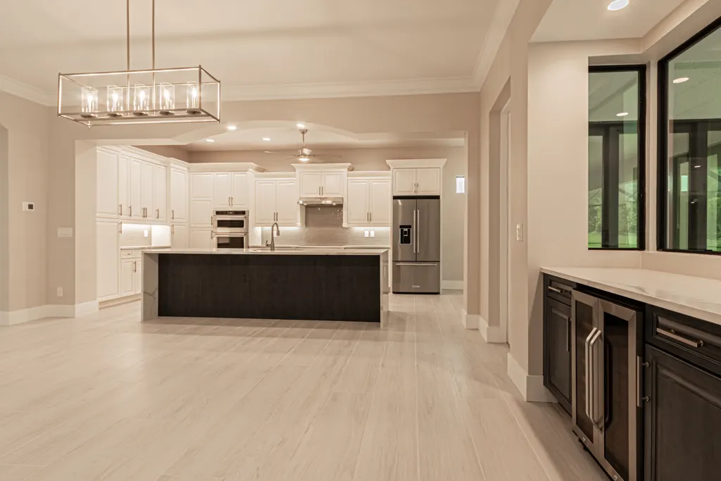 Kitchen wine cooler at The Heron House, a custom home built by Marvin Homes in Naples, Florida