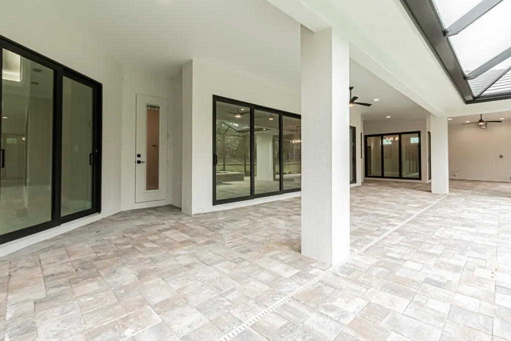 Lanai entry door at The Heron House, a custom home built by Marvin Homes in Naples, Florida