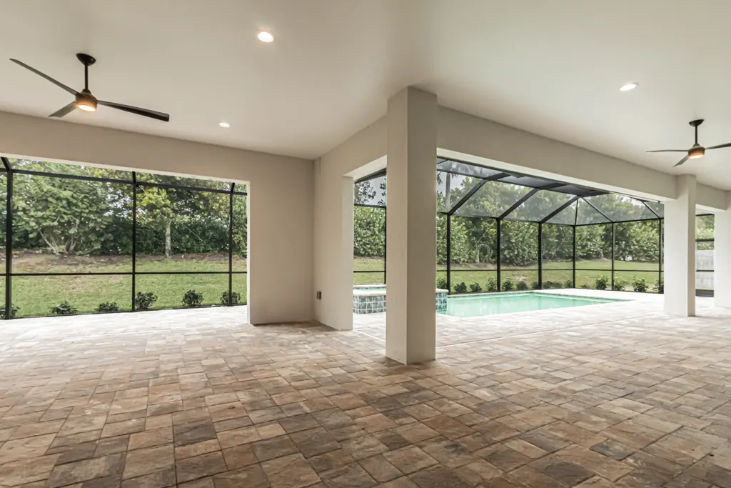 Lanai open patio at The Heron House, a custom home built by Marvin Homes in Naples, Florida