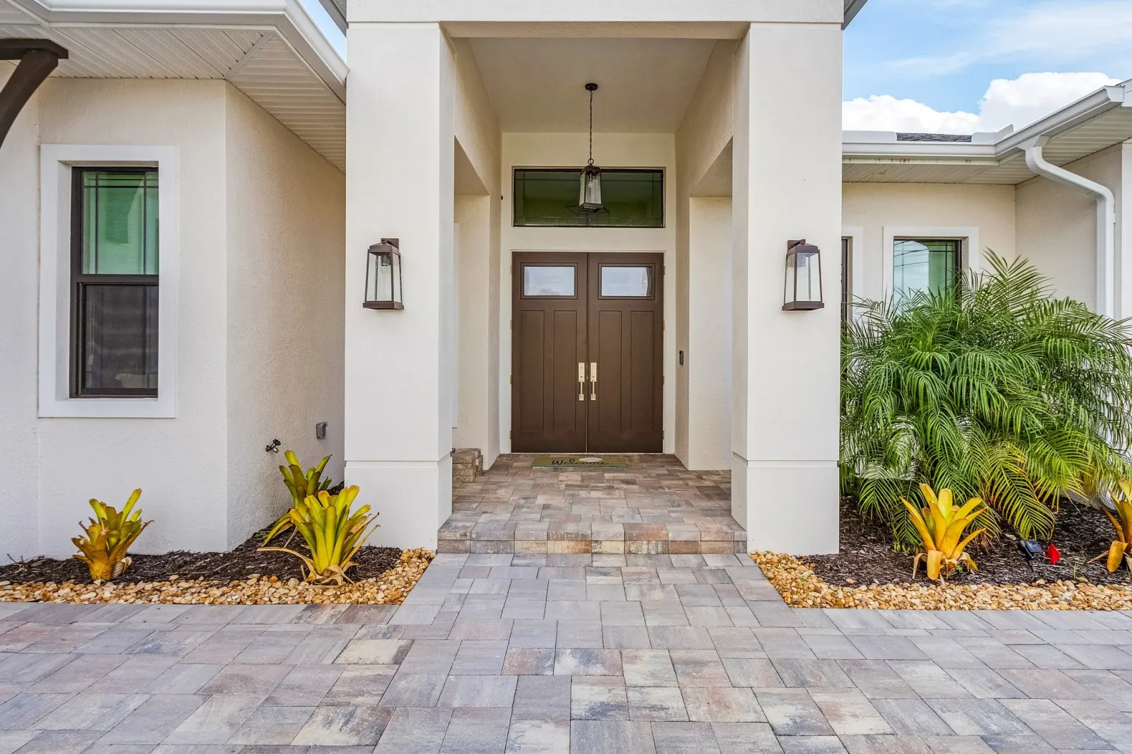 Exterior entry at The Ibis, a custom home built by Marvin Homes in Cape Coral, Florida