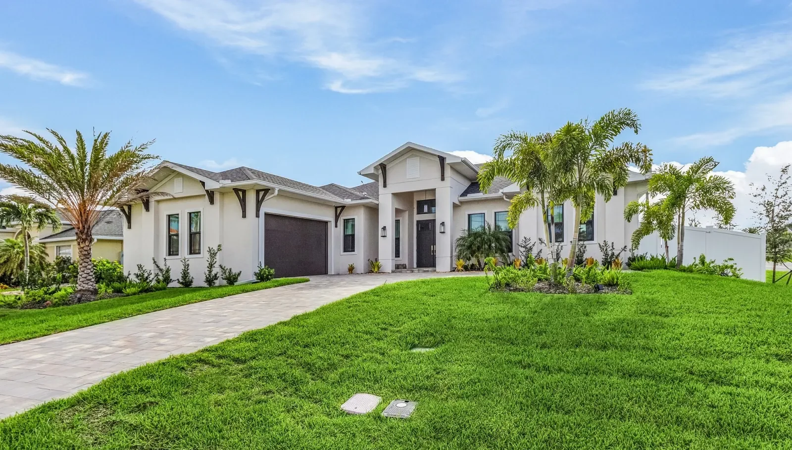 Exterior front at The Ibis, a custom home built by Marvin Homes in Cape Coral, Florida
