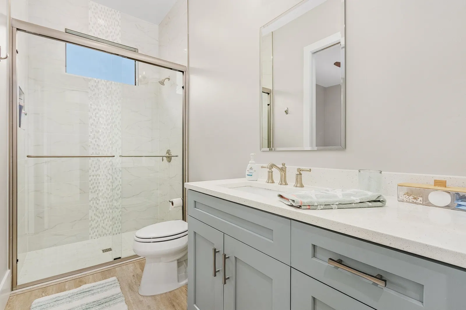 Guest bathroom at The Ibis, a custom home built by Marvin Homes in Cape Coral, Florida