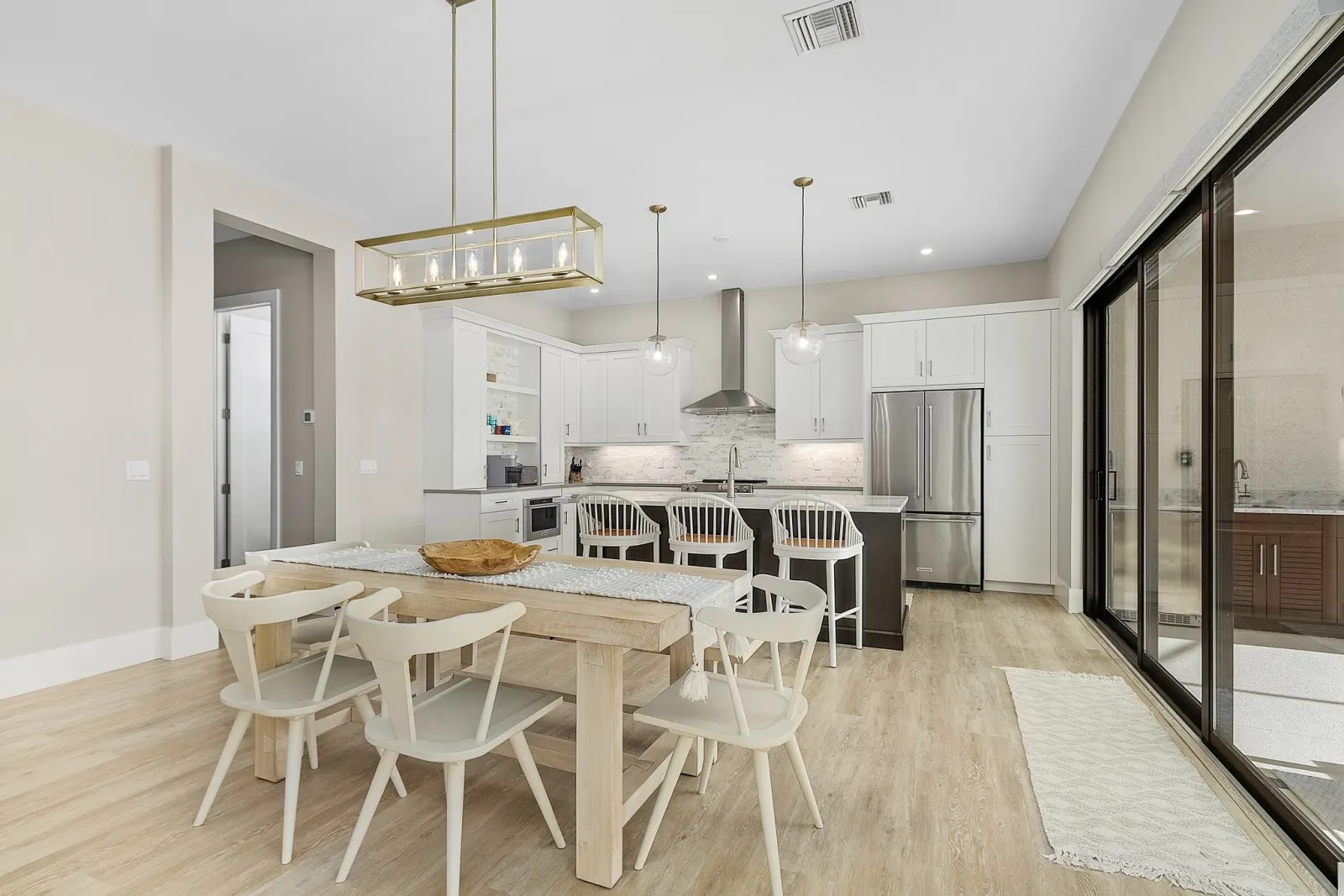 Kitchen dining at The Ibis, a custom home built by Marvin Homes in Cape Coral, Florida