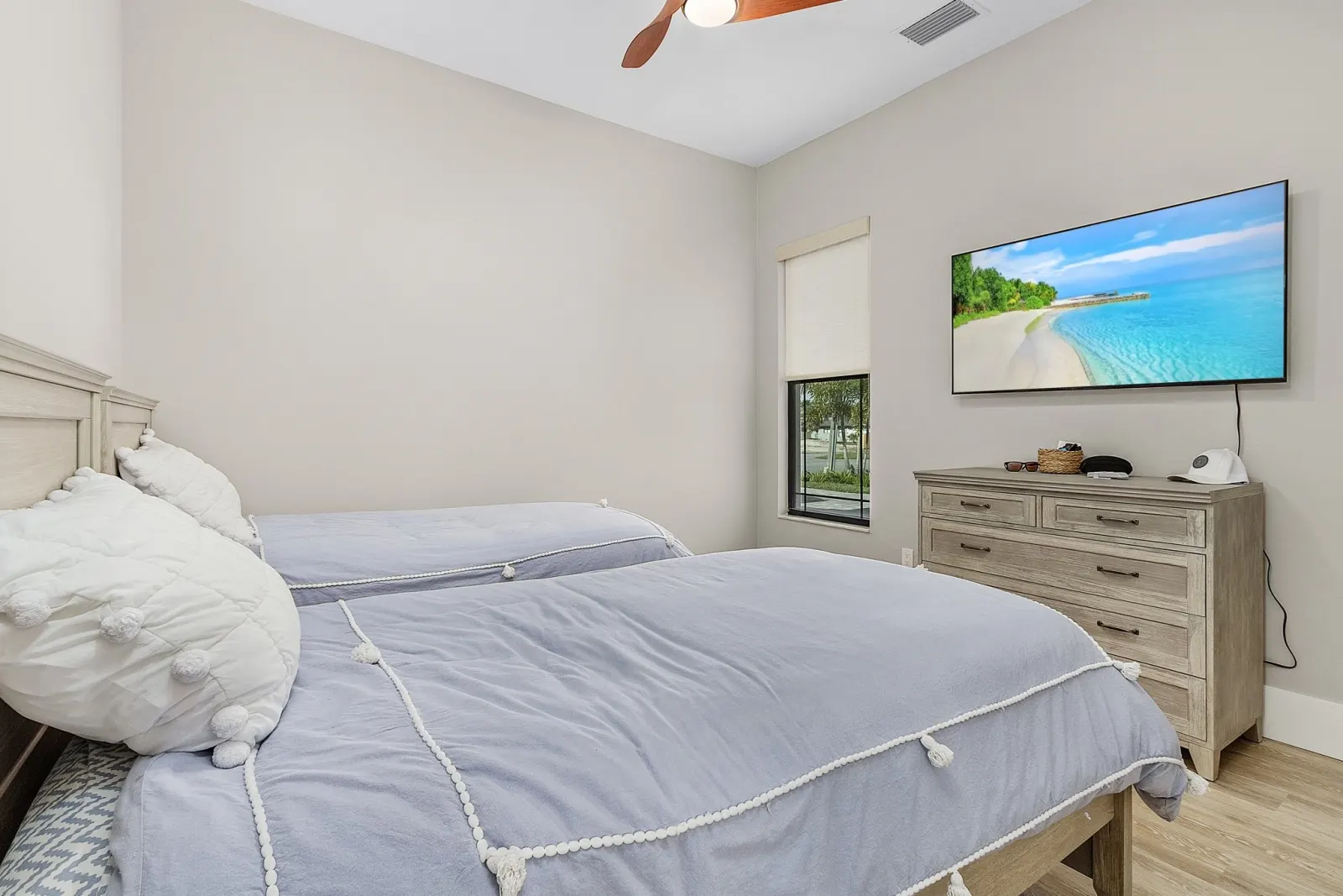 Twin bedroom at The Ibis, a custom home built by Marvin Homes in Cape Coral, Florida