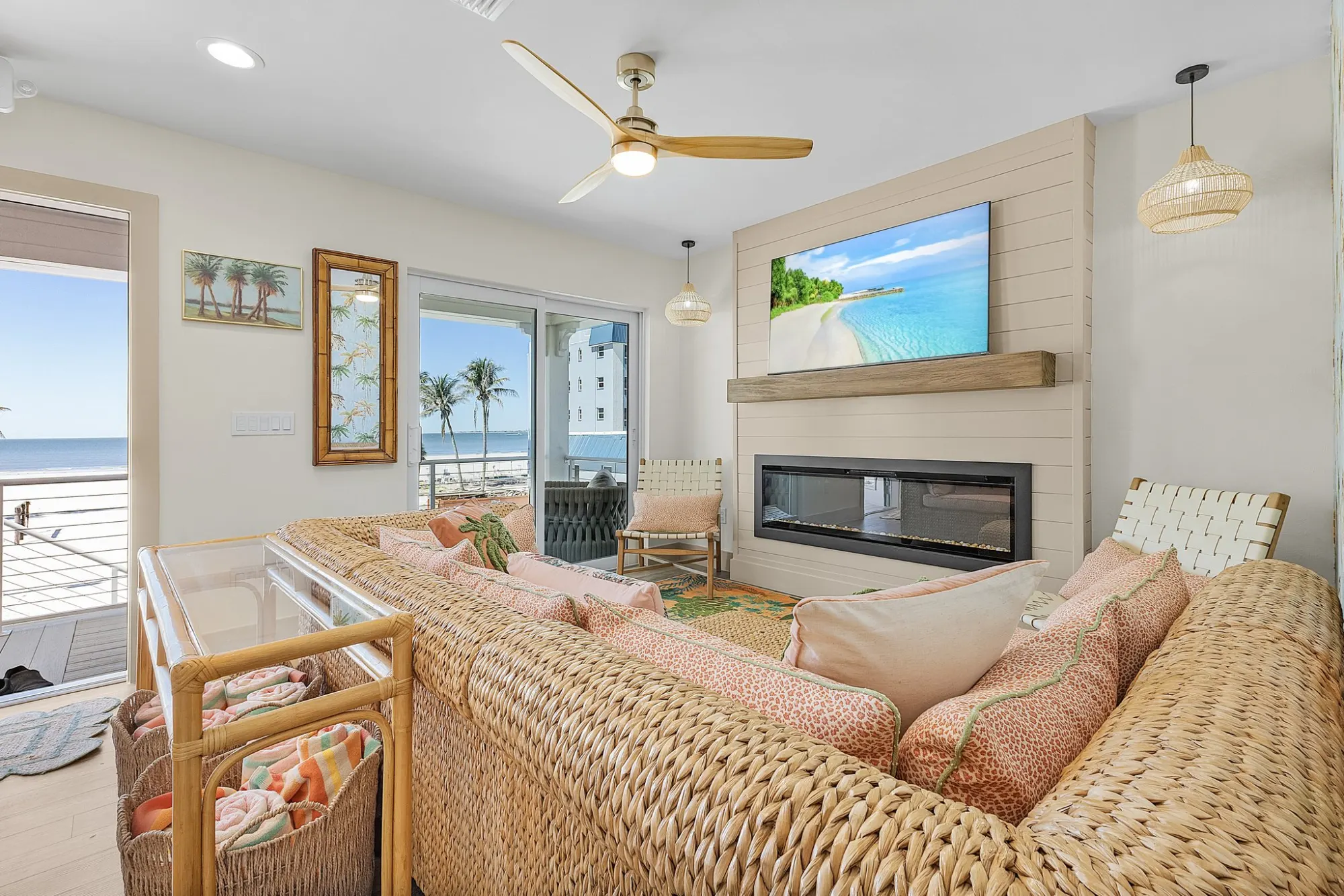 Living room fireplace ocean view in a custom home built by Marvin Homes in Southwest Florida