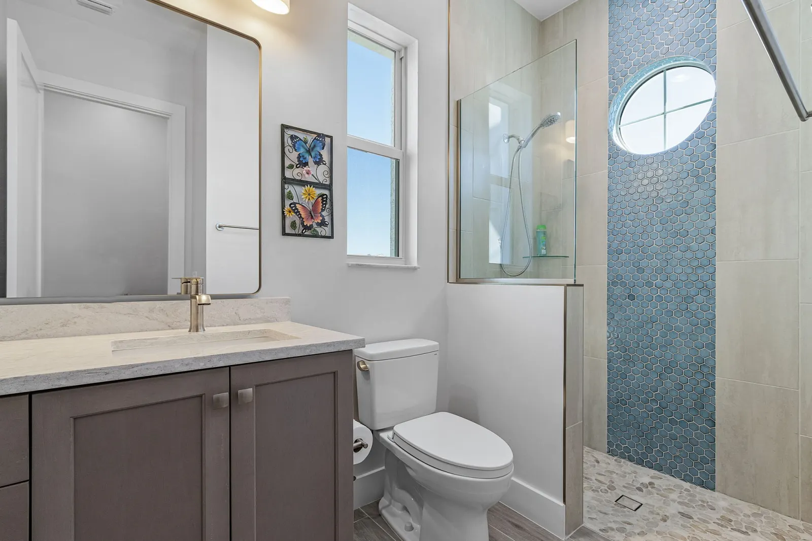 Blue hex tilework — the kind of finish selection made during design and estimating