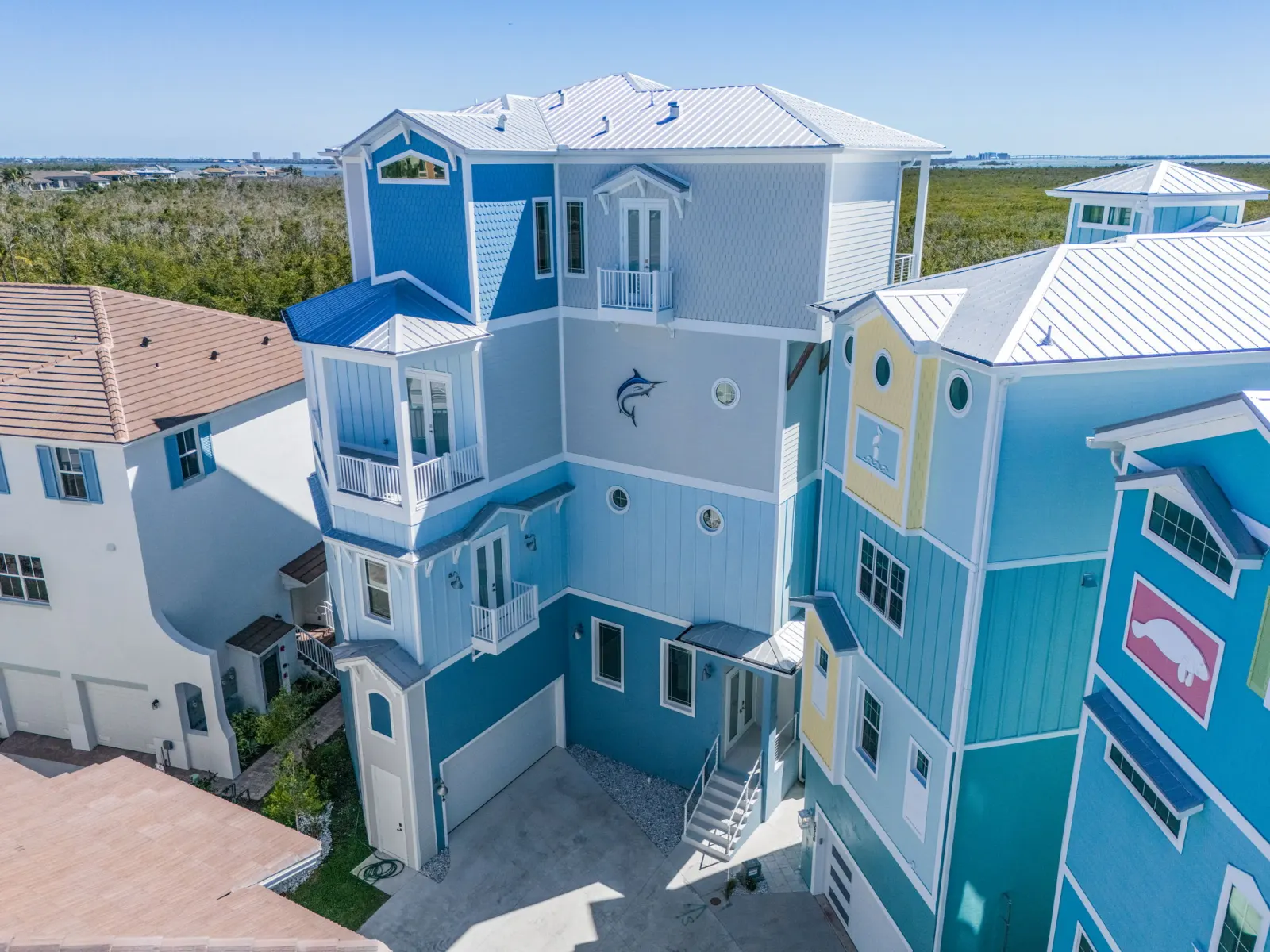 The Marlin, a three-story custom home built by Marvin Homes on a Cape Coral canal in Lee County, Florida