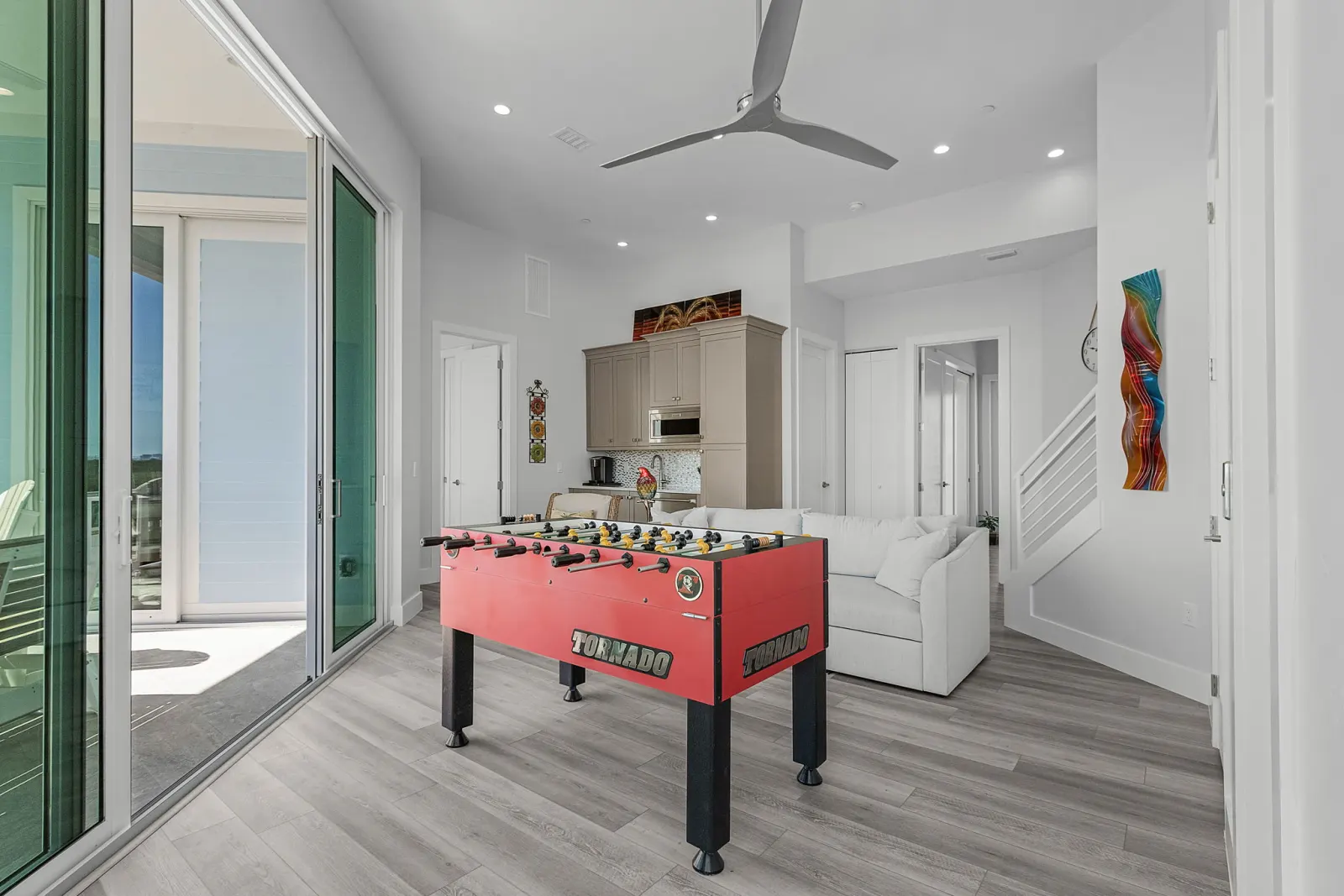 Game room foosball at The Marlin, a custom home built by Marvin Homes in Cape Coral, Florida