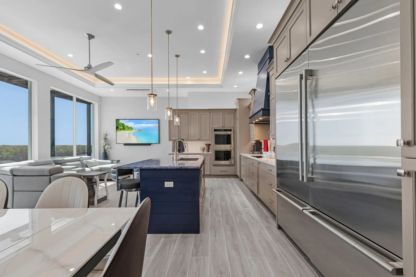 Kitchen galley view at The Marlin, a custom home built by Marvin Homes in Cape Coral, Florida