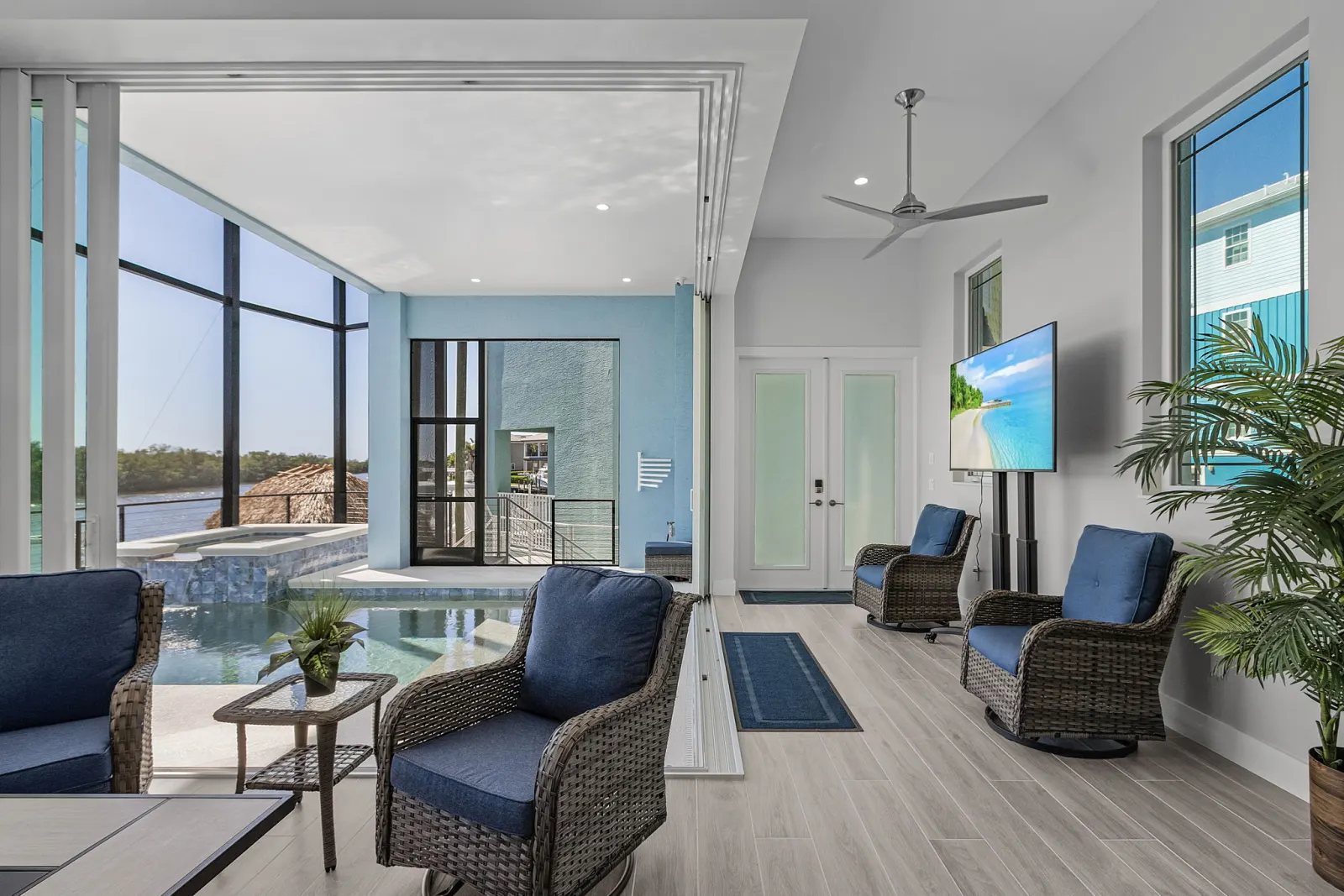 Marlin lanai pool tv lounge — custom home built by Marvin Homes in Southwest Florida