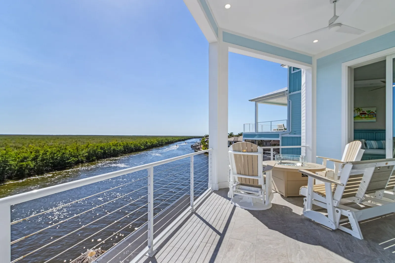 Rooftop deck firepit corner at The Marlin, a custom home built by Marvin Homes in Cape Coral, Florida