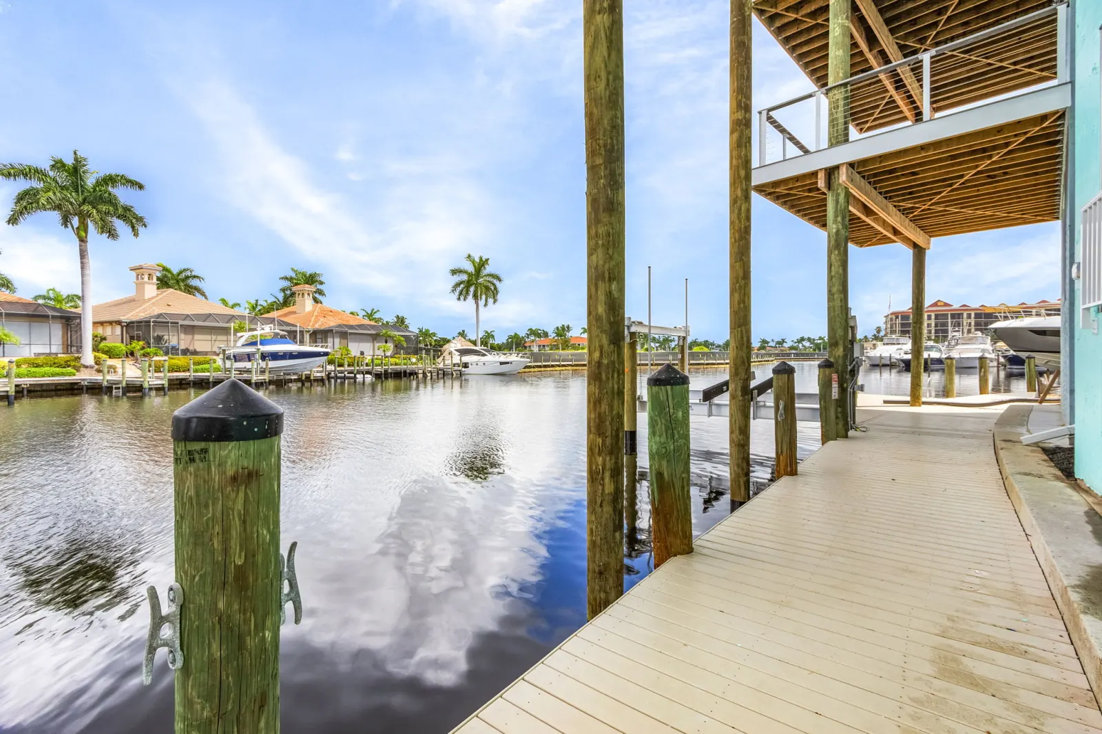 Dock walkway marina at The Octopus, a custom home built by Marvin Homes in Cape Coral, Florida