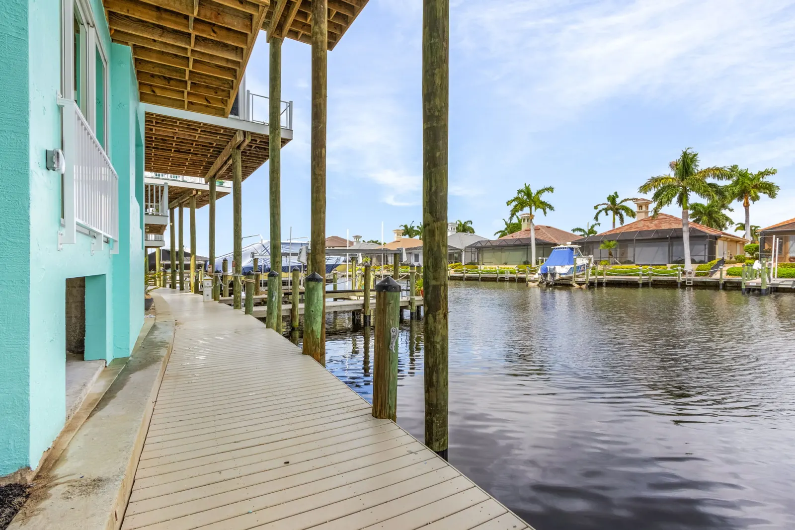 Dock walkway marina at The Octopus, a custom home built by Marvin Homes in Cape Coral, Florida