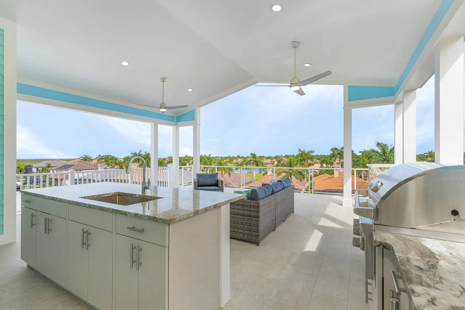 Rooftop deck outdoor kitchen sink at The Octopus, a custom home built by Marvin Homes in Cape Coral, Florida