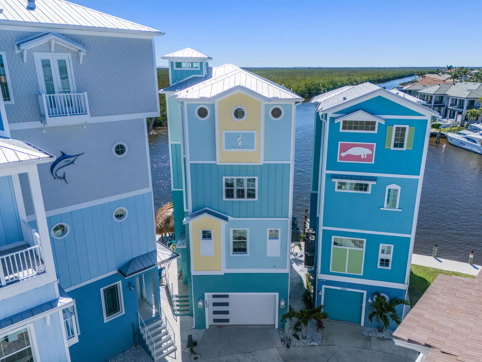 Aerial front facade at Pelican's Perch, a custom home built by Marvin Homes in Cape Coral, Florida