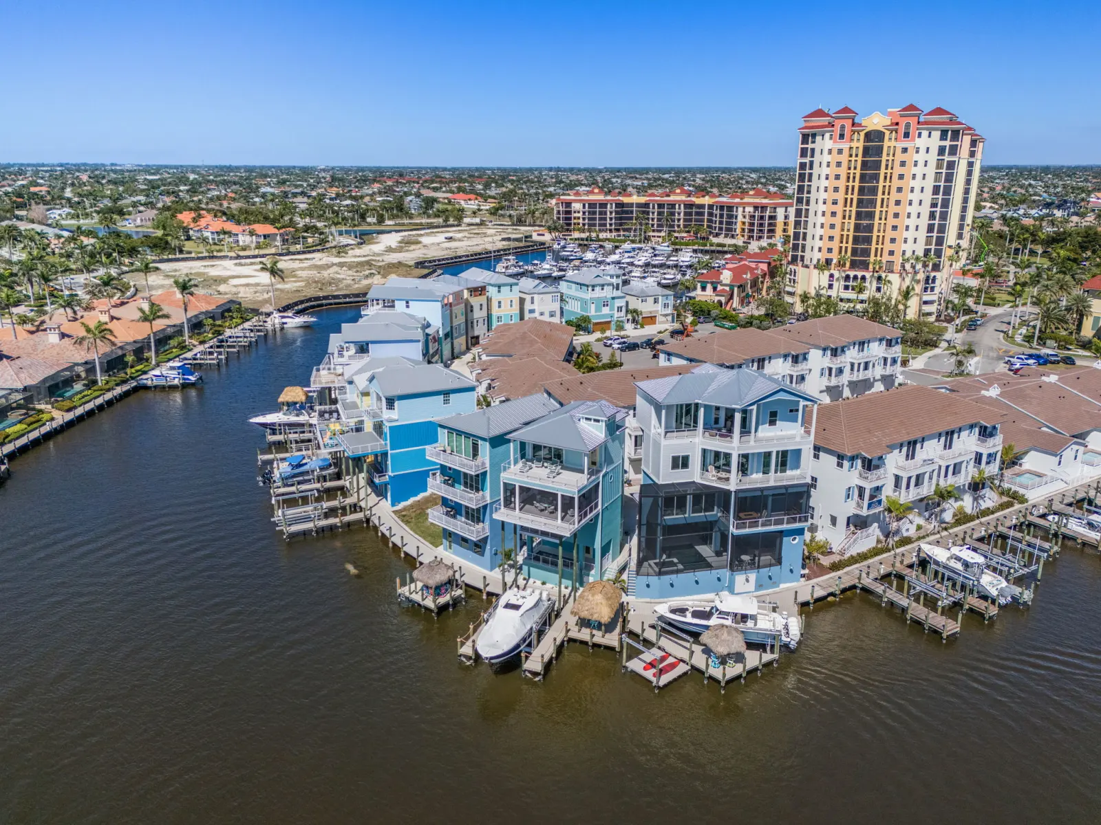 Aerial marina community wide at Pelican's Perch, a custom home built by Marvin Homes in Cape Coral, Florida