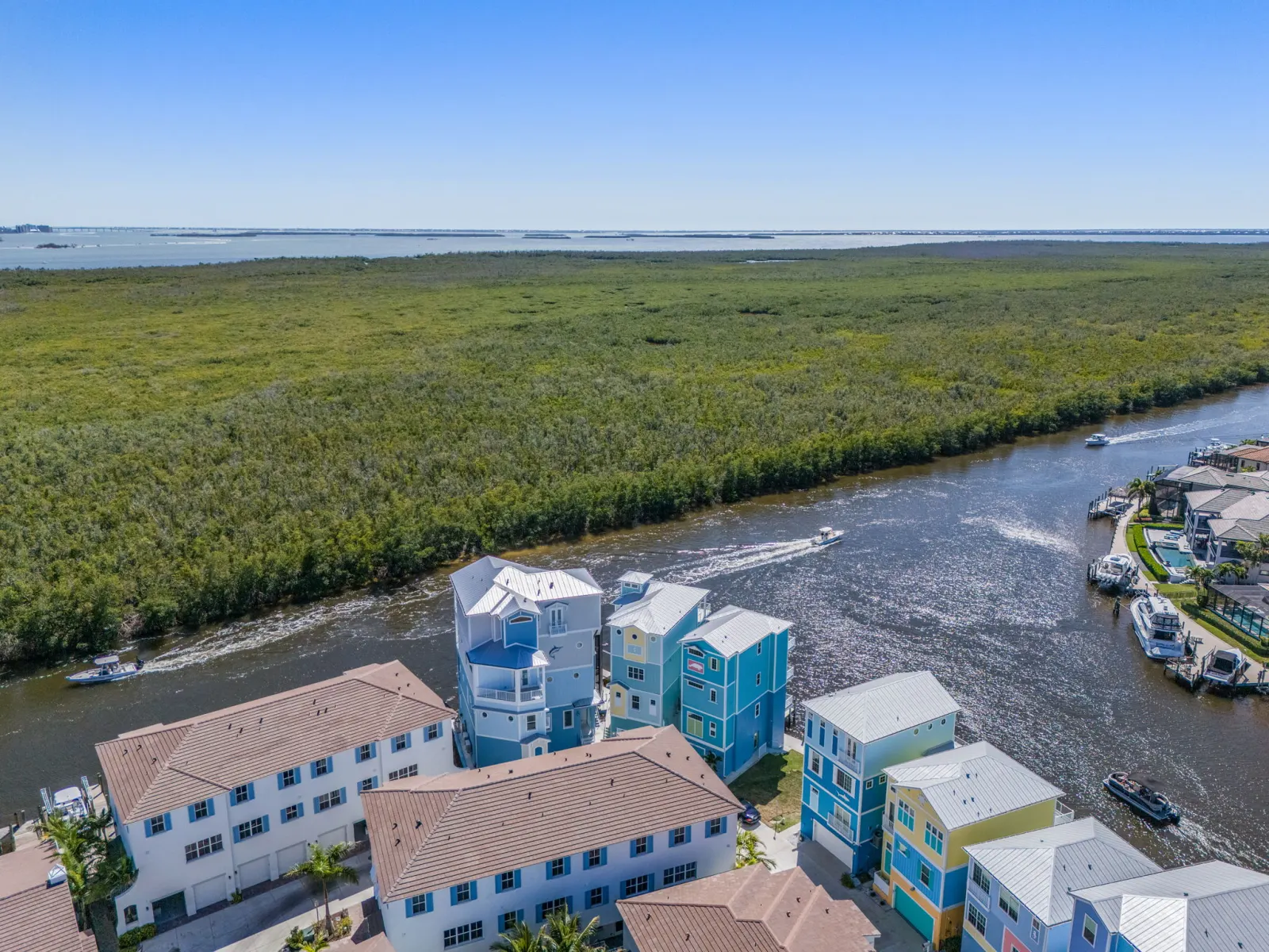 Aerial view of a canal-front lot in Southwest Florida at the preliminary design stage