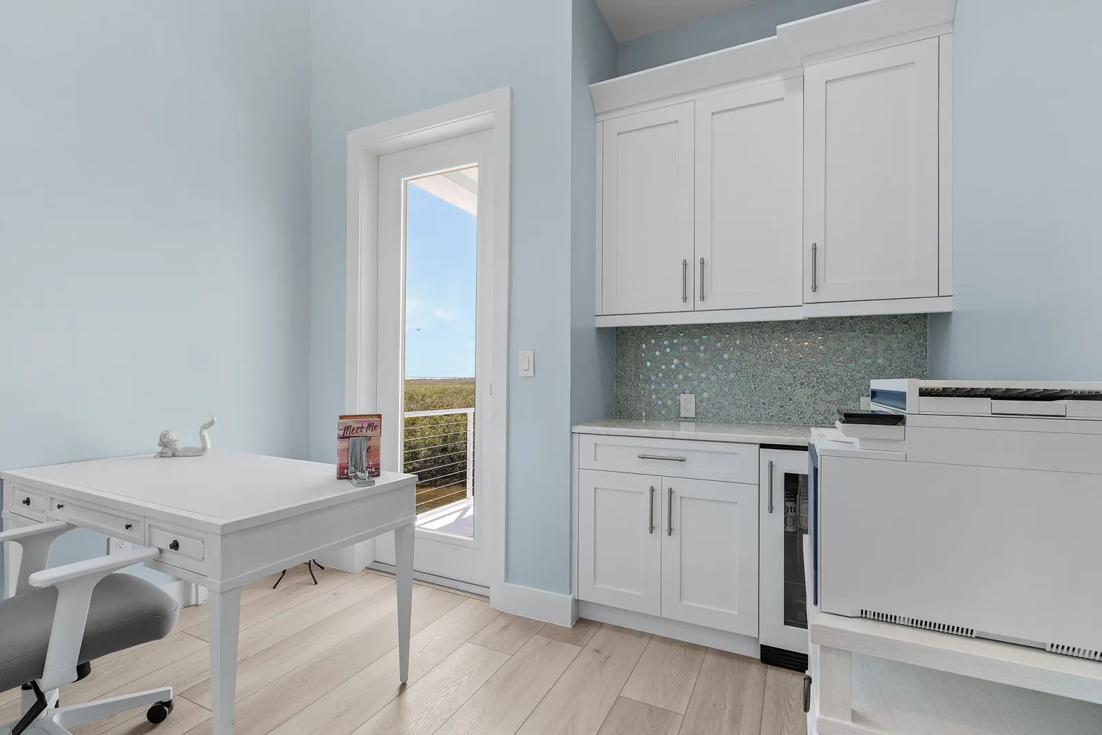 Office desk wet bar at Pelican's Perch, a custom home built by Marvin Homes in Cape Coral, Florida
