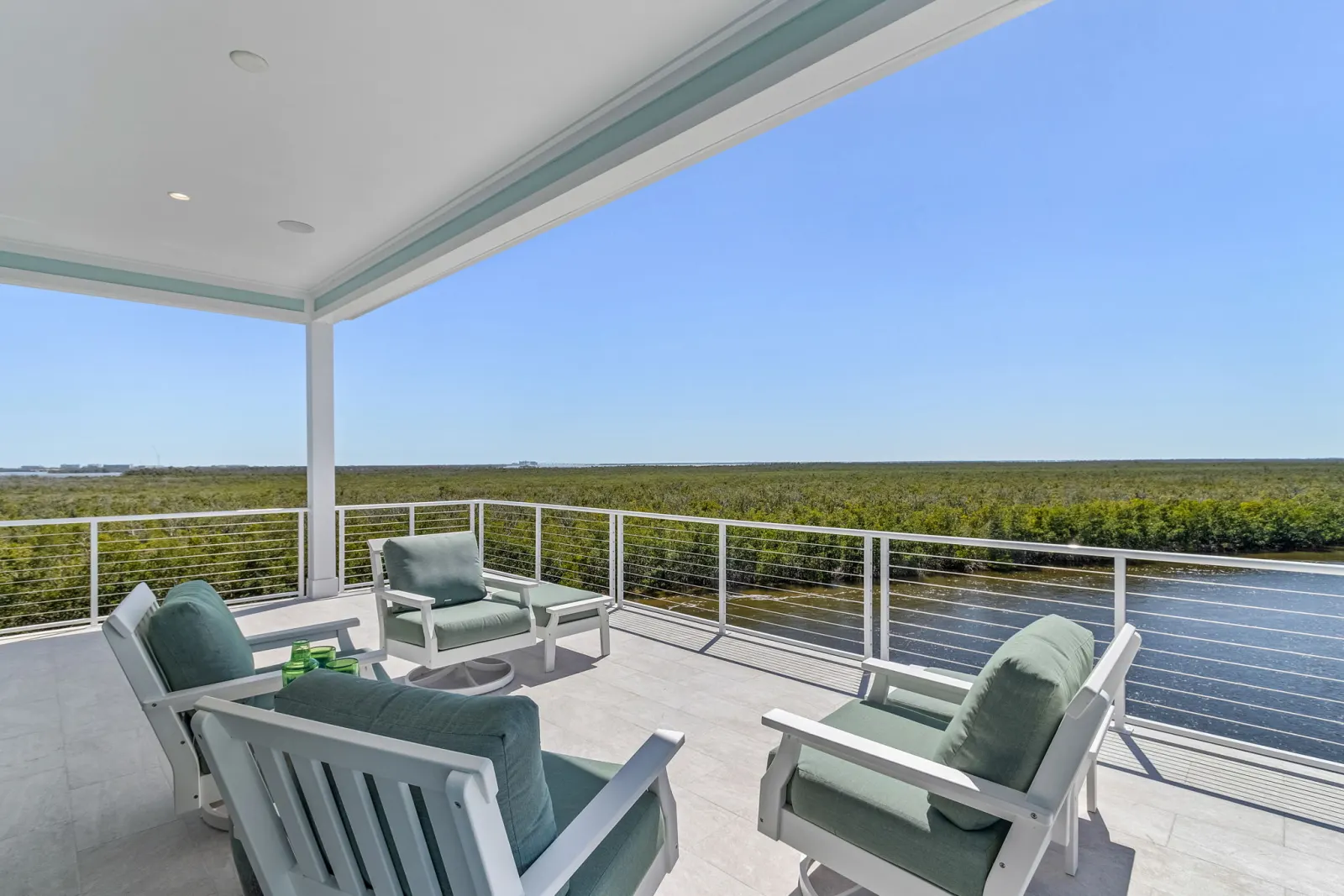 Rooftop deck lounge preserve view at Pelican's Perch, a custom home built by Marvin Homes in Cape Coral, Florida